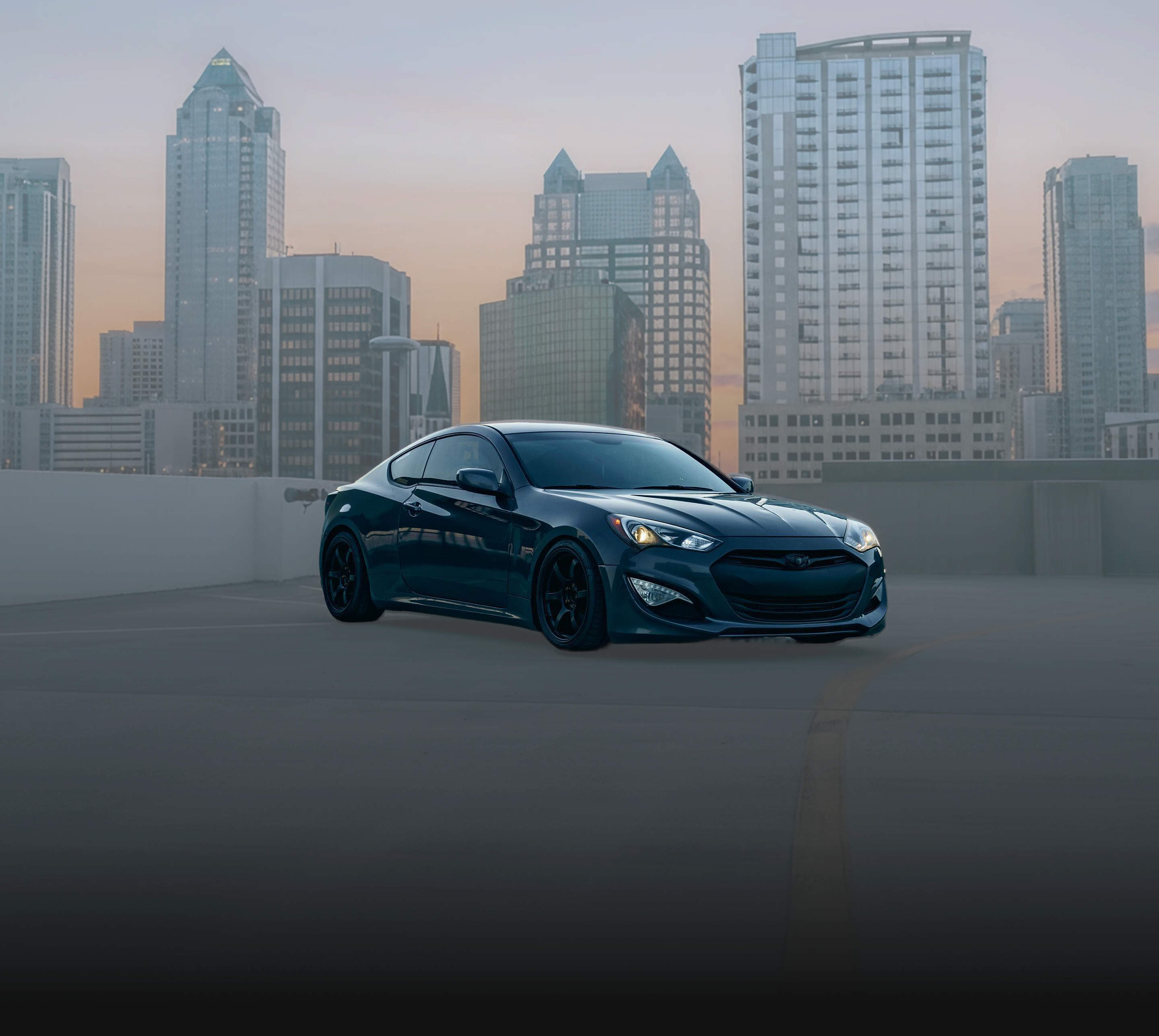 Car with Kumho tires parked on rooftop